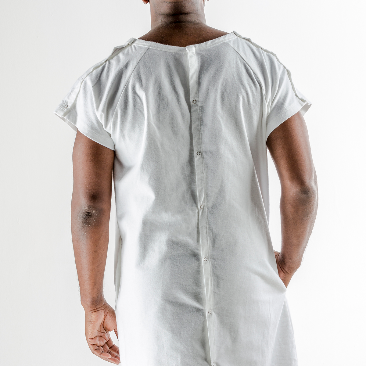 Back of hospital gown showing snaps